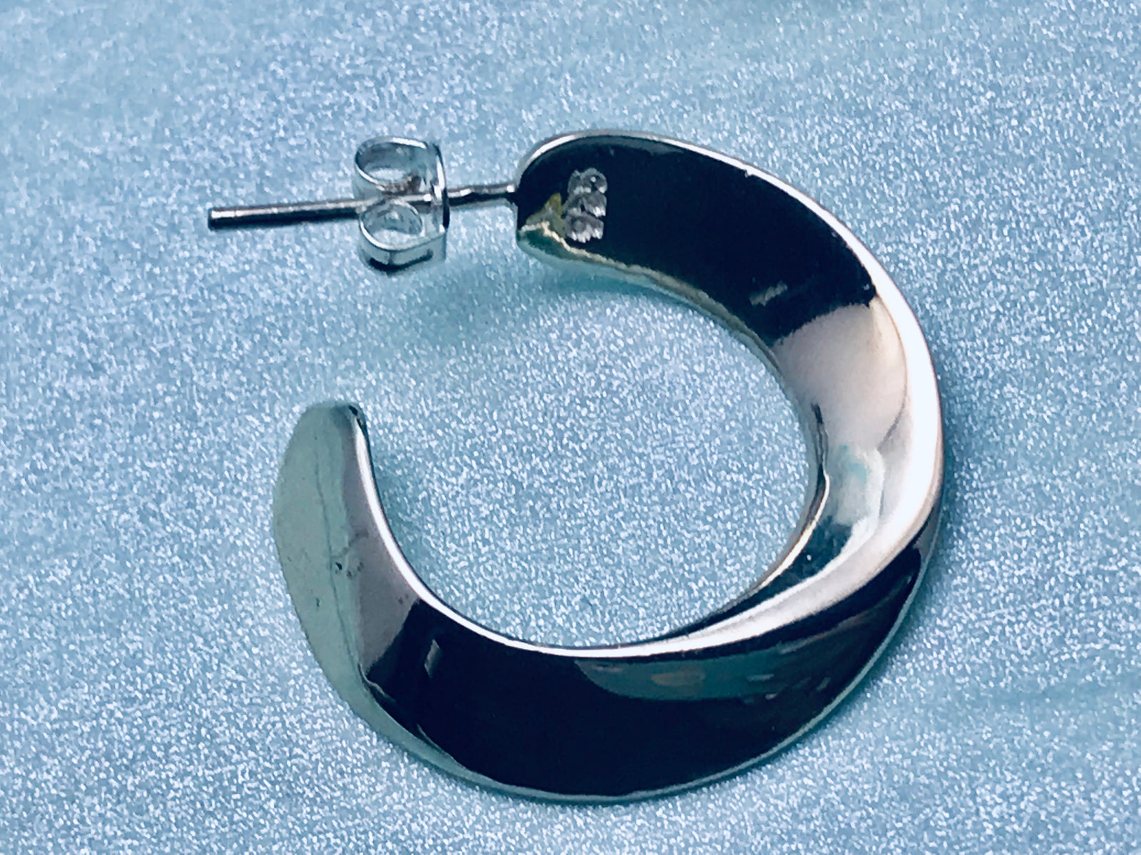 Medium Size Twisted Hoop Silver Earrings